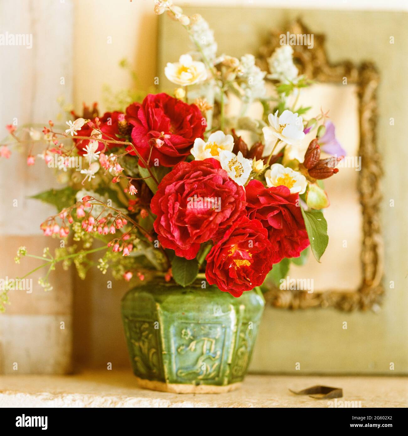 Red and white flower arrangement Stock Photo Alamy