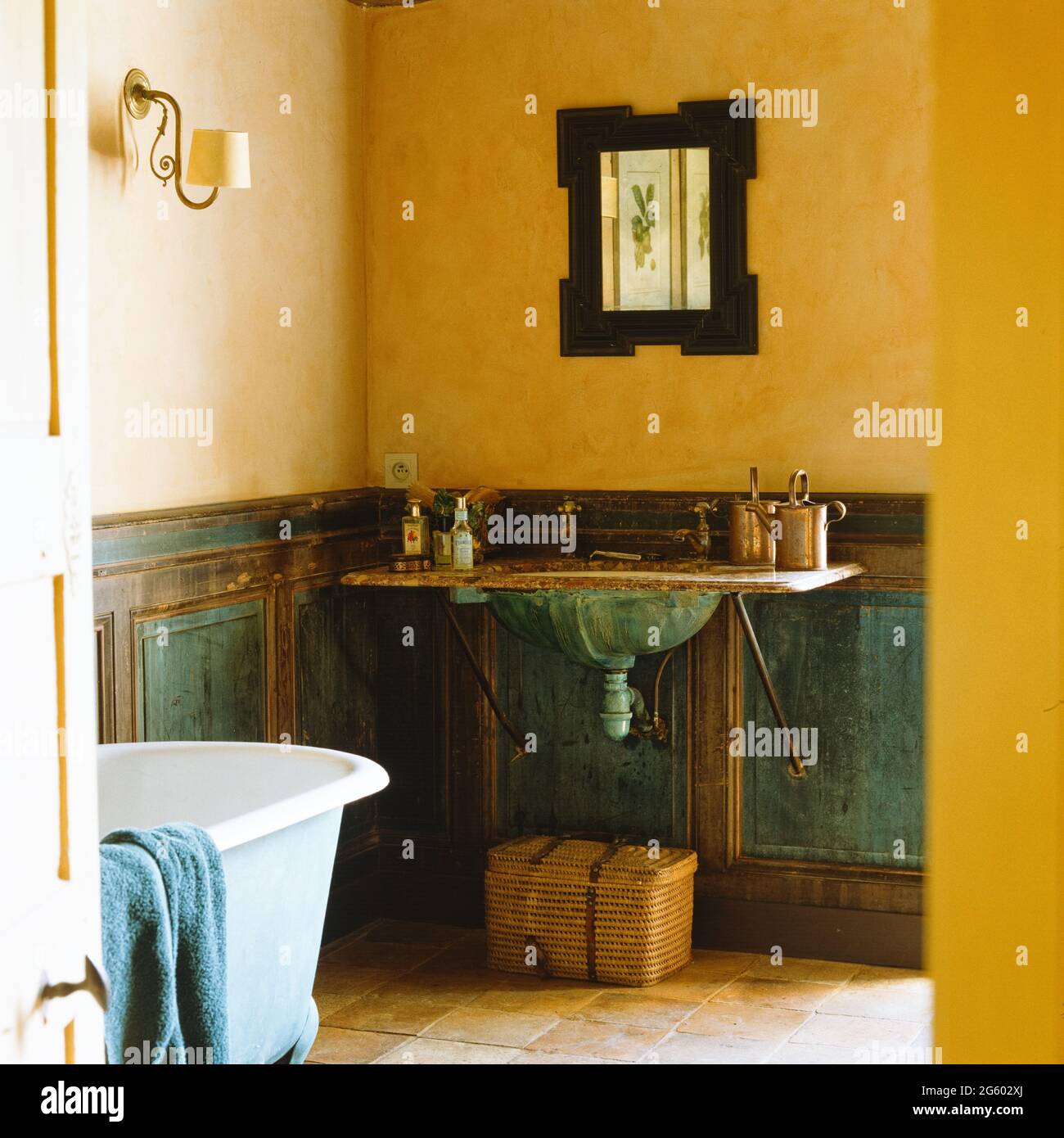 Yellow and blue rustic bathroom Stock Photo Alamy