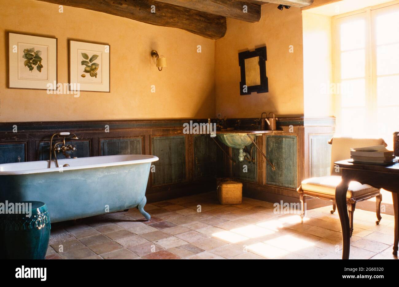 Rustic style bathroom with freestanding bathtub Stock Photo Alamy