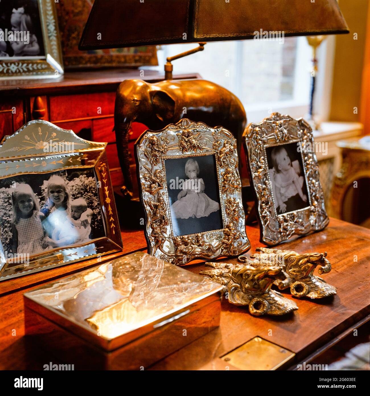 Silver picture frames with old photographs Stock Photo