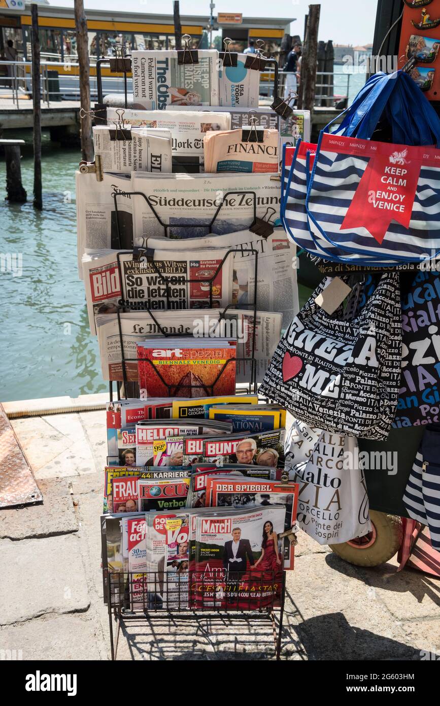 A rack of Italian and European newspapers and magazine on sale in