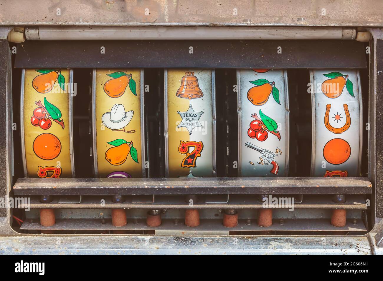 Close up of a weathered vintage slot machine Stock Photo