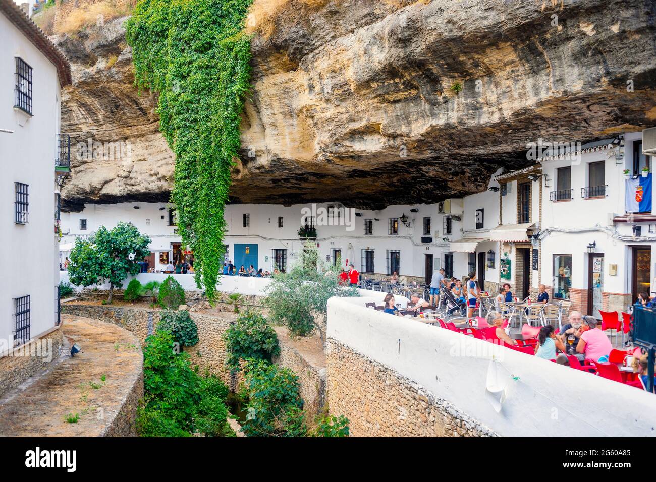 White washed houses built under the rock in Setenil de las Bodegas, Andalucia, Spain Stock Photo