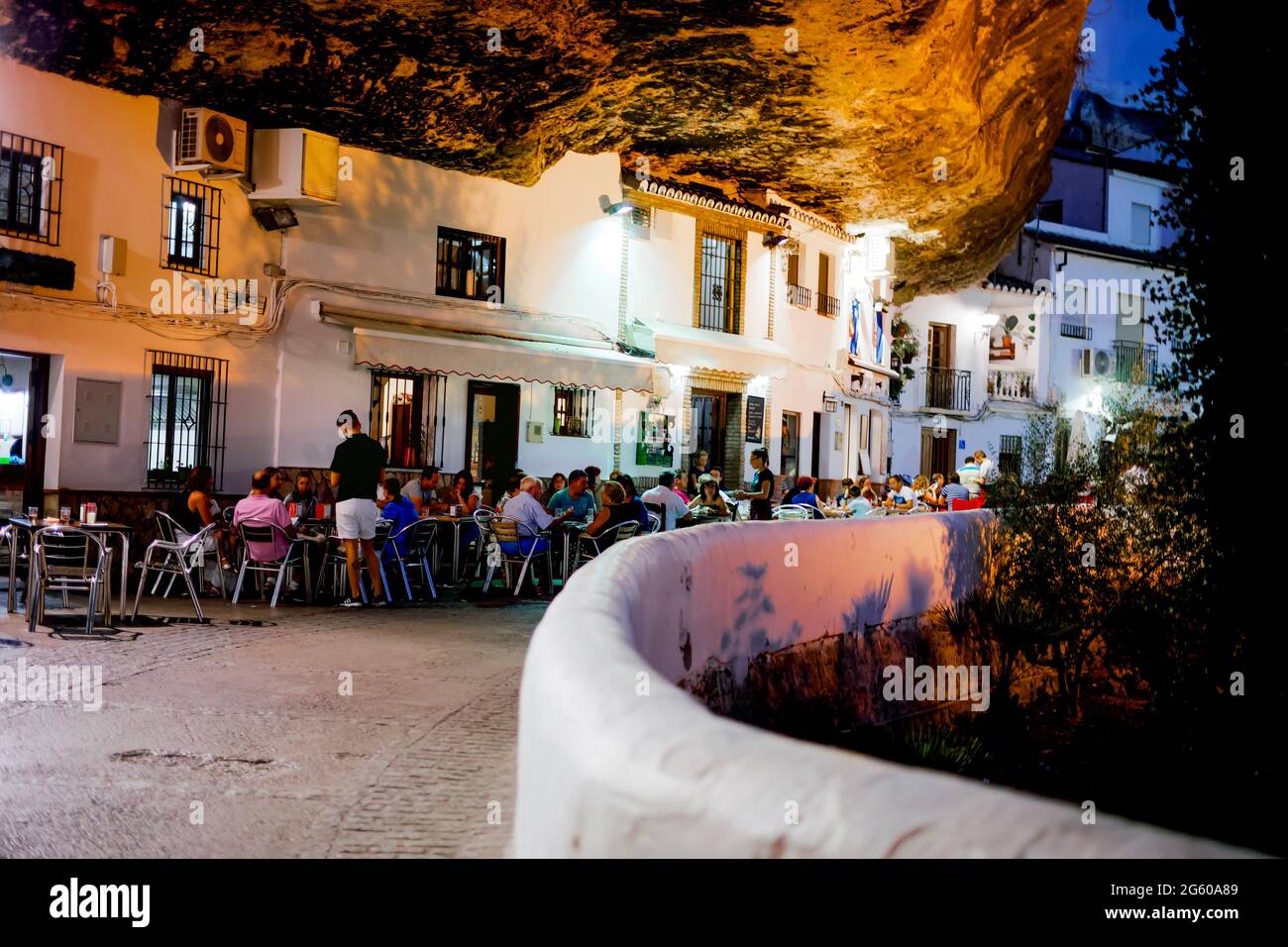 Tourist enjoying good food and drinks in the restaurants of Setenil de las  Bodegas, Andalucia, Spain Stock Photo - Alamy