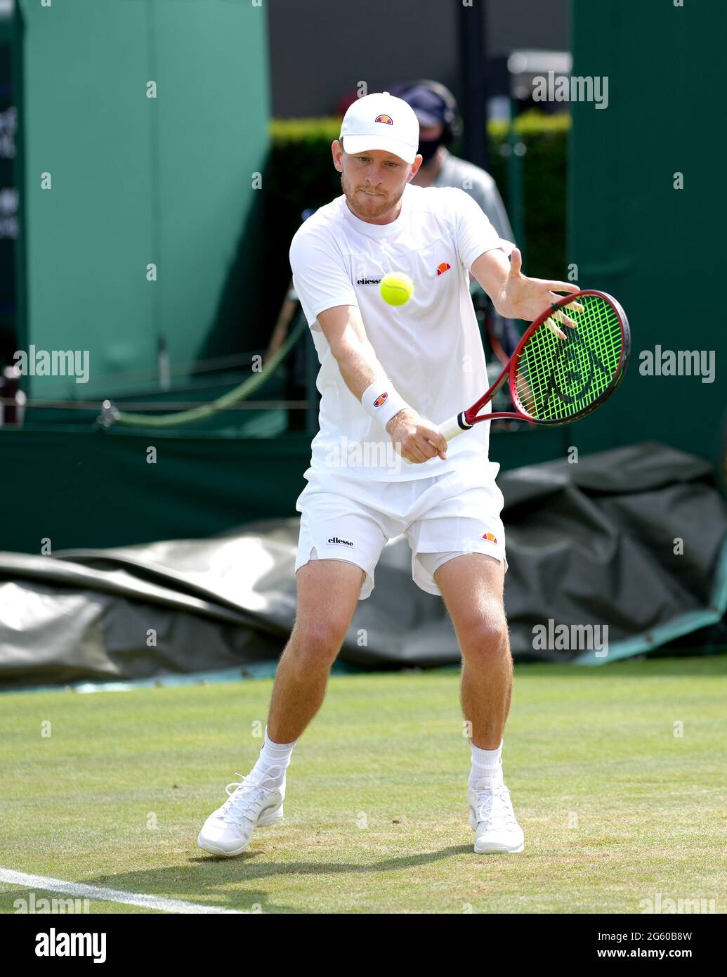 Luke Johnson in action during his first round gentlemen's doubles match  with Anton Matusevich against Alex de Minaur and Matt Reid on court 10 on  day four of Wimbledon at The All