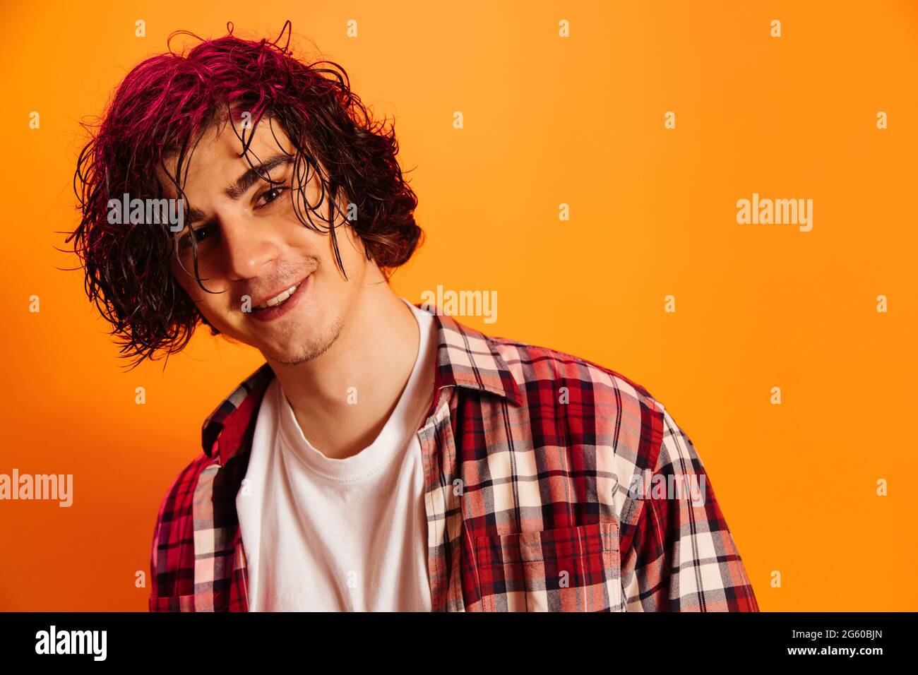 One in an orange shirt and one in hi-res stock photography and images ...