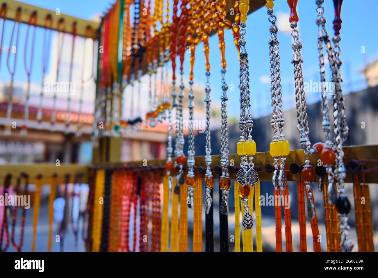 Rosary beads hanging at middle eastern bazaar Stock Photo