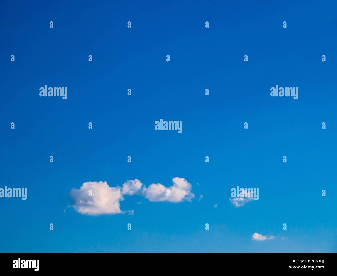 Beautiful small fluffy clouds in the blue sky Stock Photo