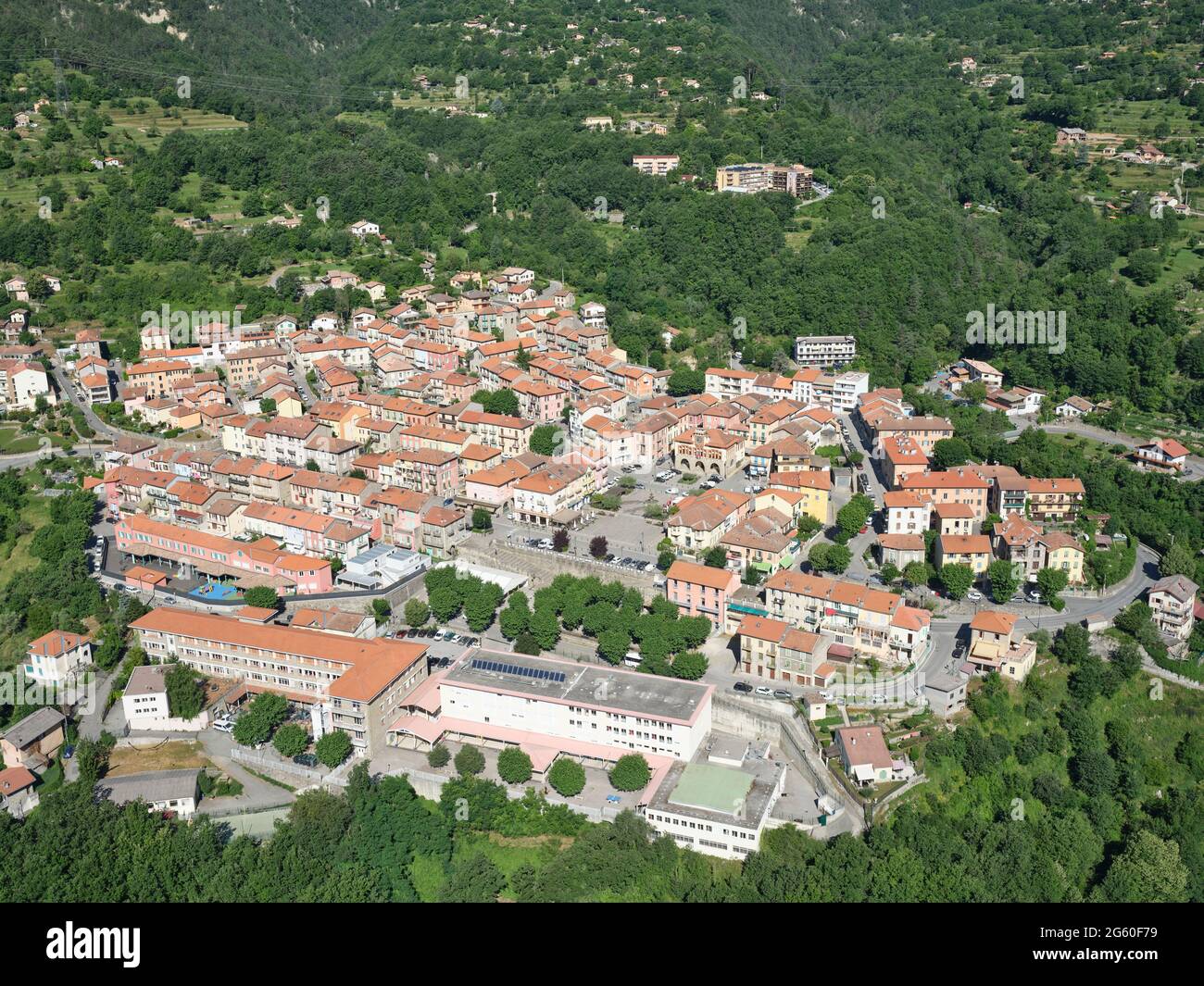 AERIAL VIEW. City of Roquebillière in the heart of the Vésubie Valley. Alpes-Maritimes, France. Stock Photo