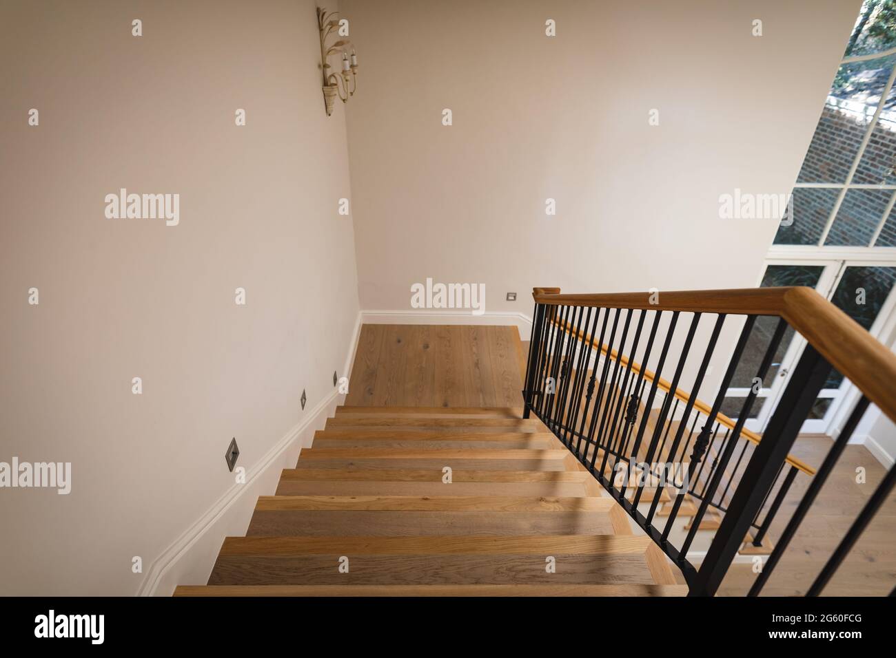 General view of house interior with i spacious hallway and staircase Stock Photo