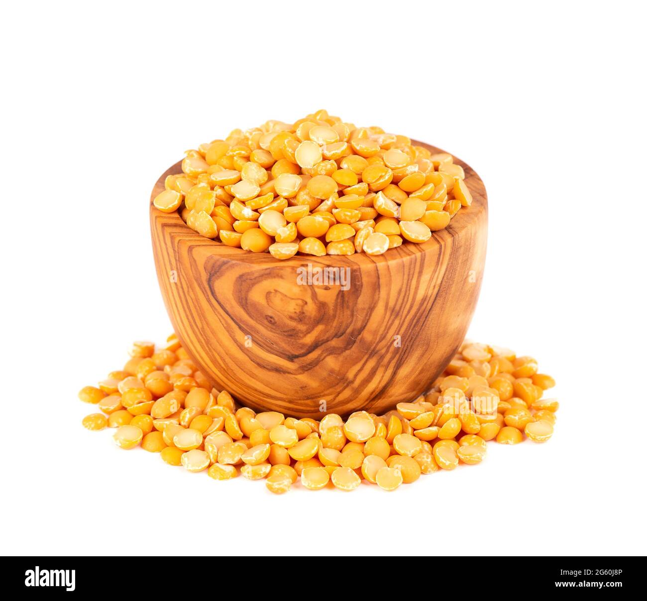 Dry yellow split peas in olive bowl, isolated on white background