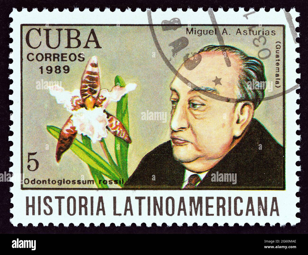 CUBA - CIRCA 1989: A stamp printed in Cuba from the 'Latin American History' issue shows Miguel Asturias and Odontoglossum rossii (Guatemala). Stock Photo