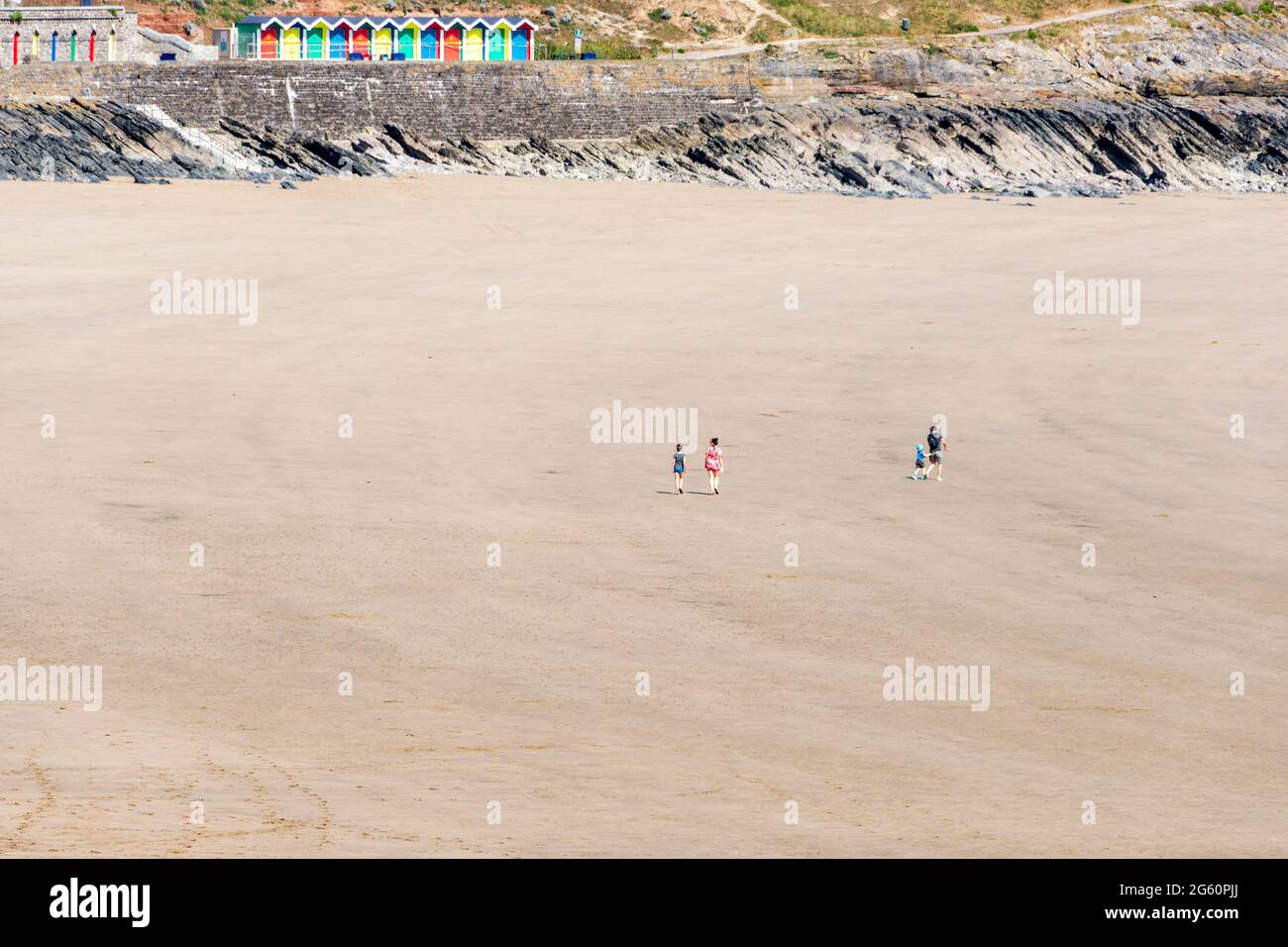 Due to the Covid-19 lockdown the beach at Barry Island is almost deserted despite it being a sunny spring bank holiday Stock Photo