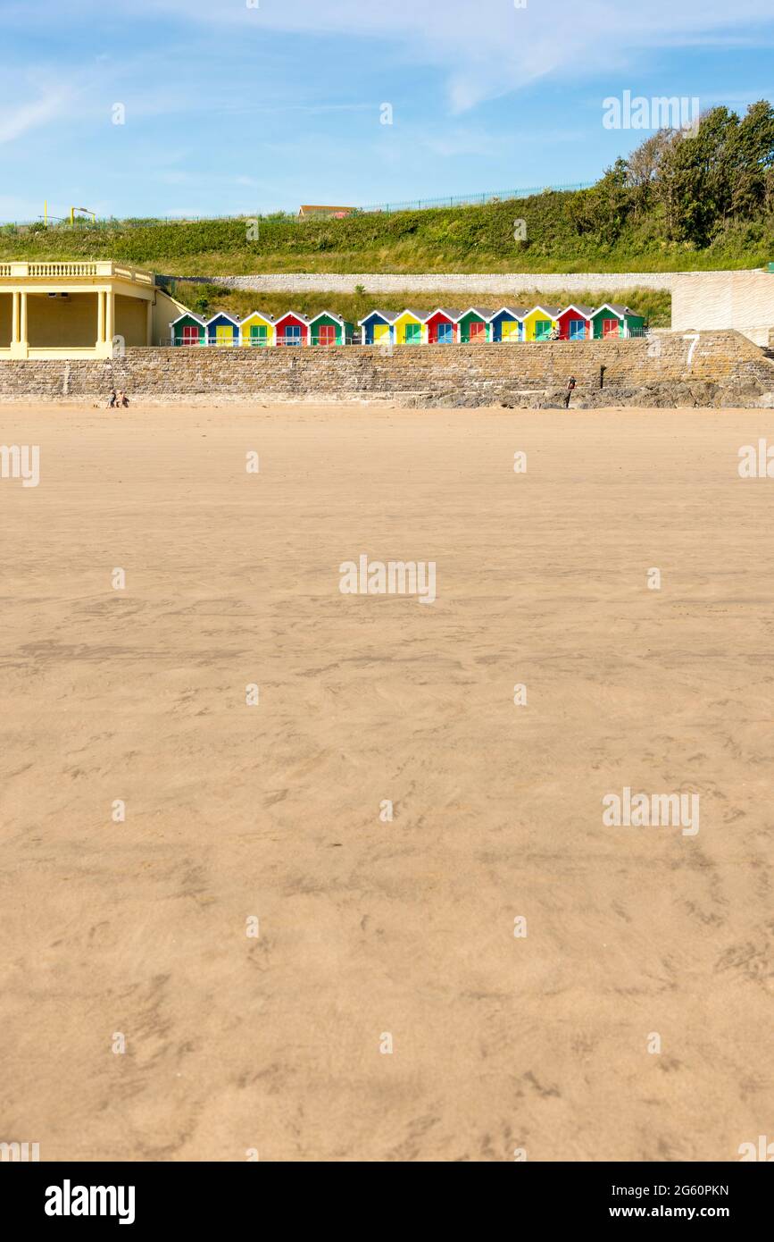Due to the Covid-19 lockdown the beach at Barry Island is almost deserted despite it being a sunny spring bank holiday Stock Photo