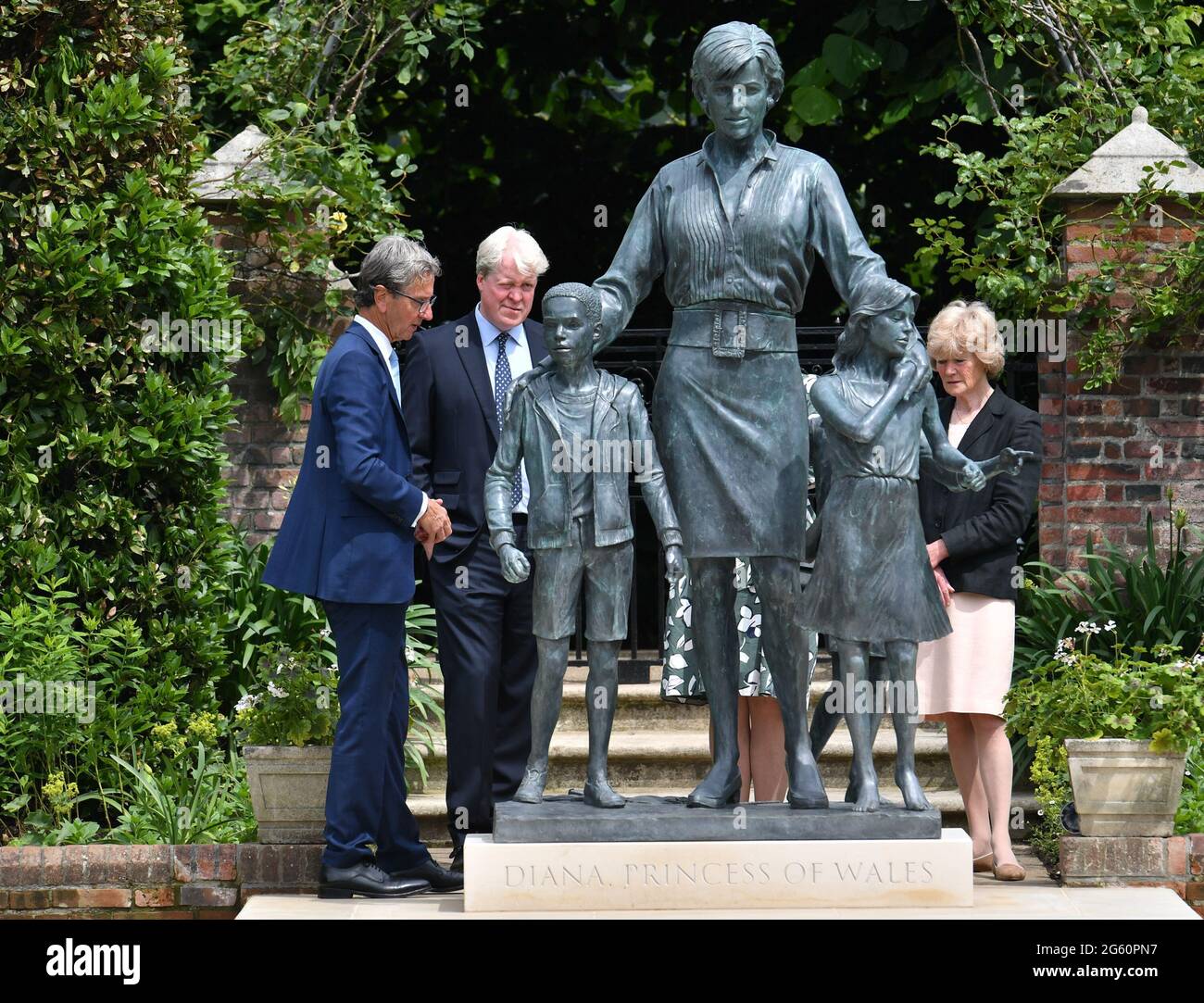 Sculptor Ian Rank Broadley Earl Spencer And Lady Sarah Mccorquodale After The Unveiling Of A Statue Of Diana Princess Of Wales In The Sunken Garden At Kensington Palace London On What Would Have