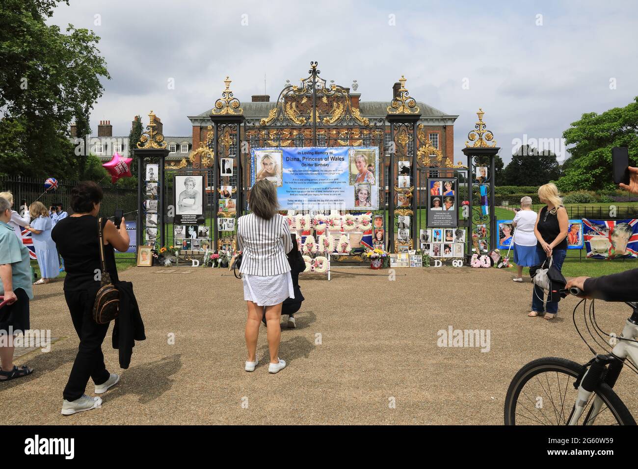London, UK, July 1st 2021. On what would have been Princess Diana's 60th birthday and the unveiling of a new statue of her by Princes William and Harry, loyal fans decorated the gates of Kensington Palace with photos, flowers and balloons. Monica Wells/Alamy Live News Stock Photo