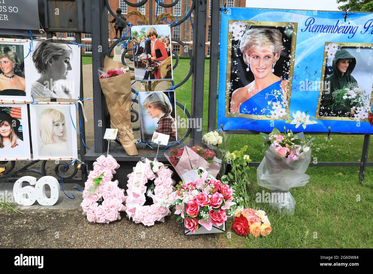 London, UK, July 1st 2021. On what would have been Princess Diana's 60th birthday and the unveiling of a new statue of her by Princes William and Harry, loyal fans decorated the gates of Kensington Palace with photos, flowers and balloons. Monica Wells/Alamy Live News Stock Photo