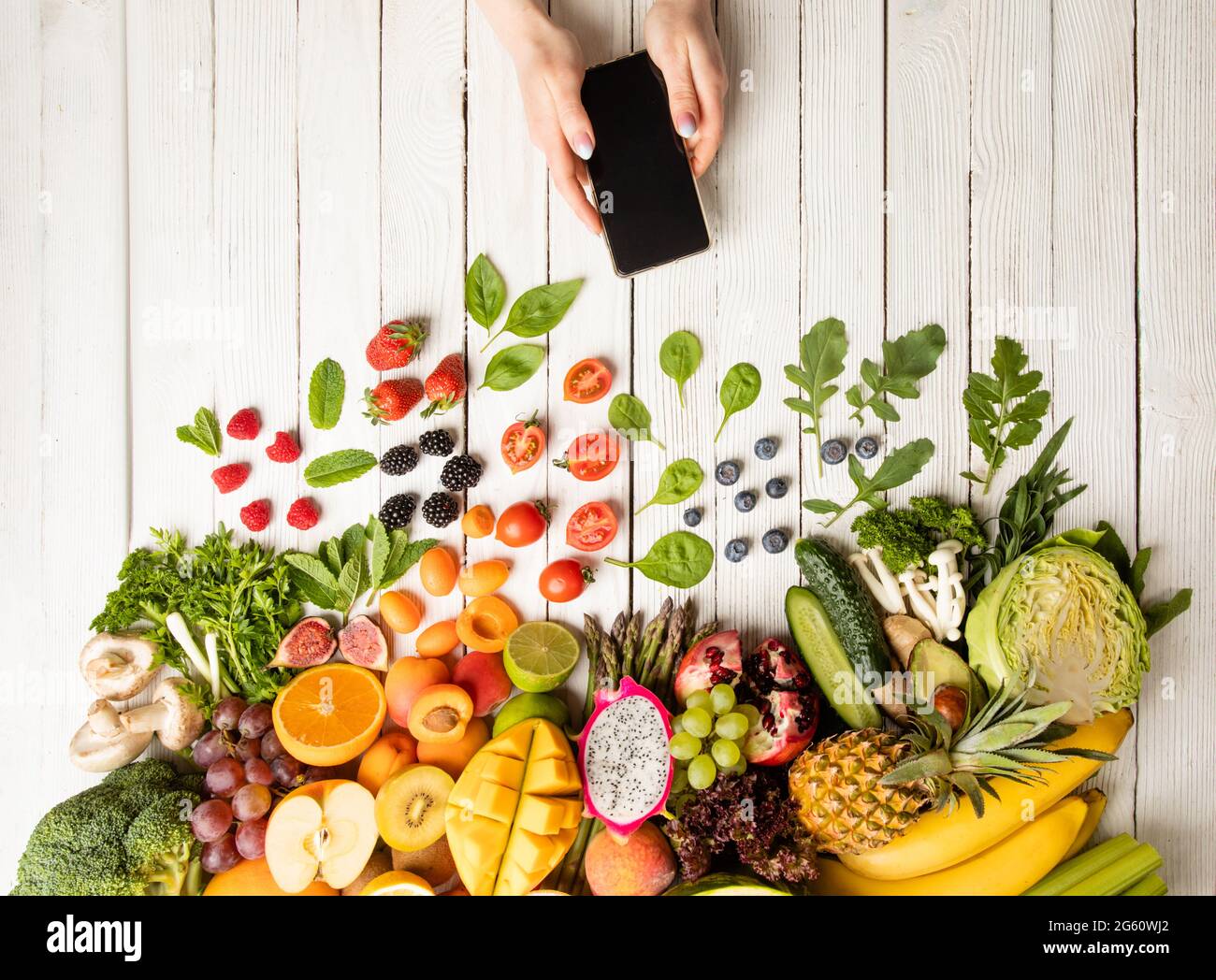 Ordering different fruits and vegetables using smartphones Stock Photo Alamy