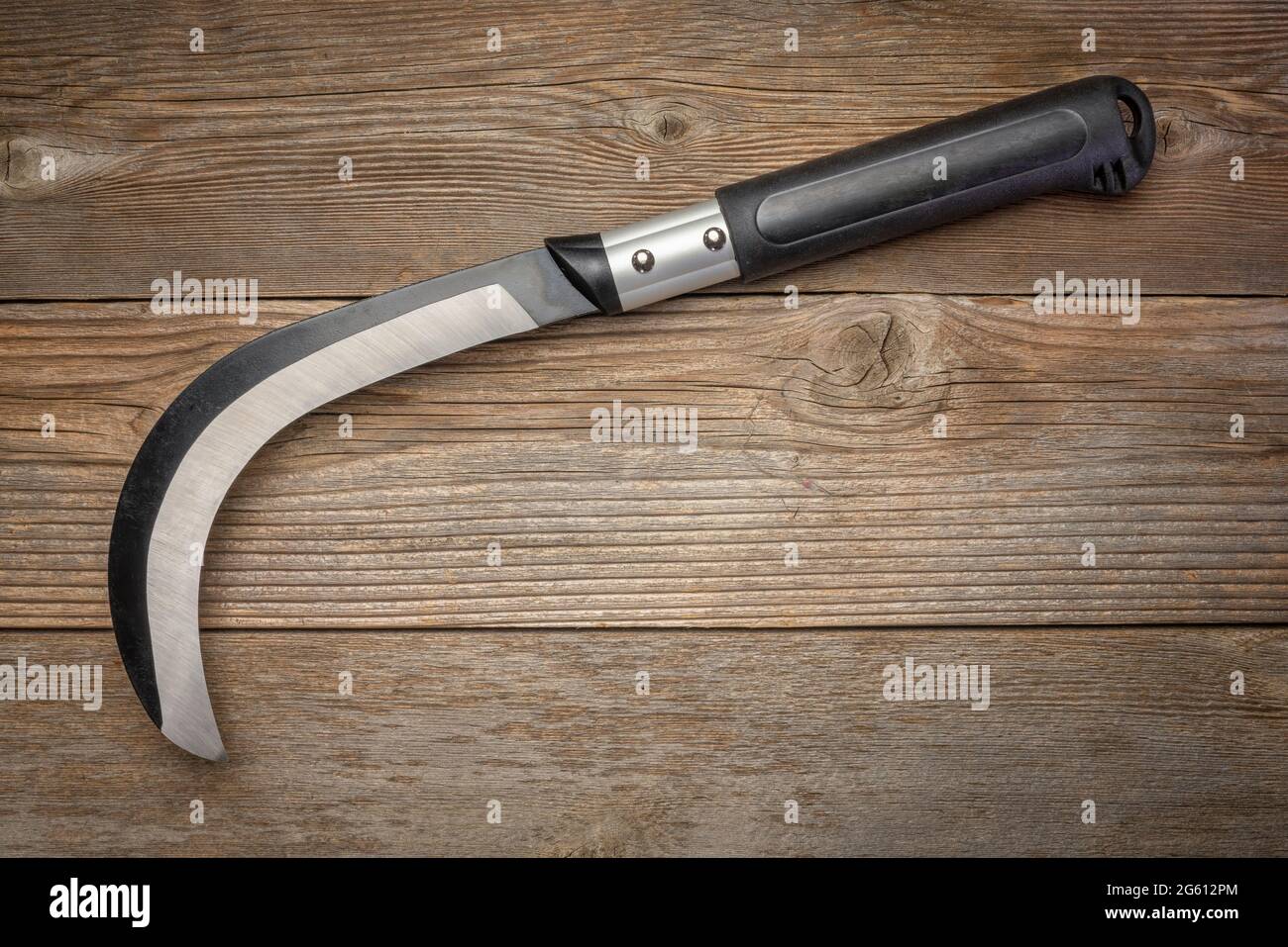 brush clearing sickle with carbon steel blade and aluminum handle