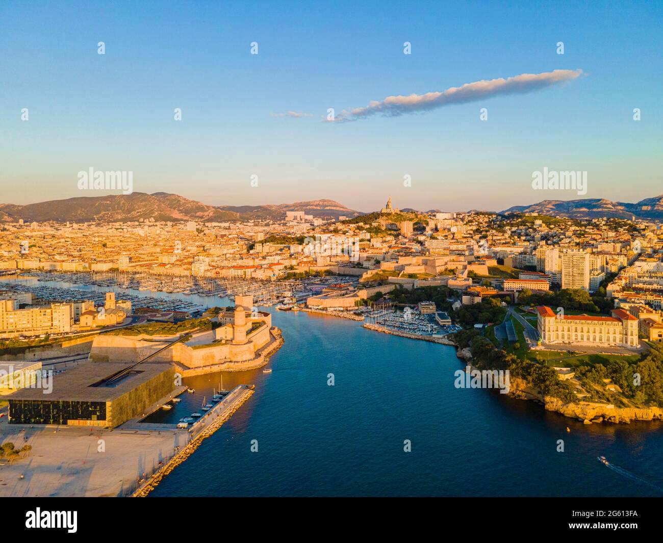 France, Bouches du Rhone, Marseille, general view of the Old Port, with the Fort Saint Jean, the Mucem, the Pharo Palace and the Notre Dame de la Garde basilica (aerial view) Stock Photo