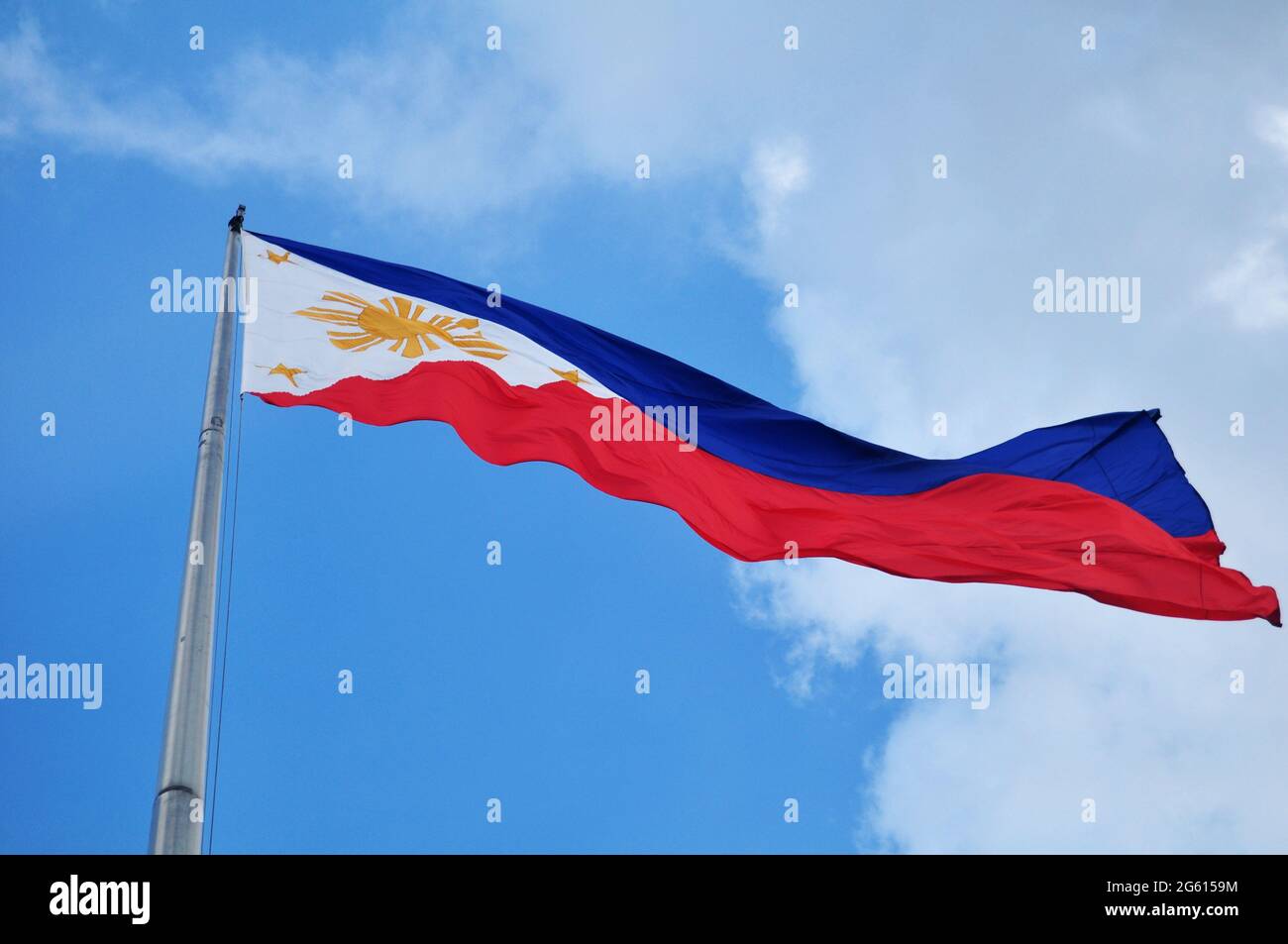 Flag of Philippine or filipino nation on steel pole at outdoor in