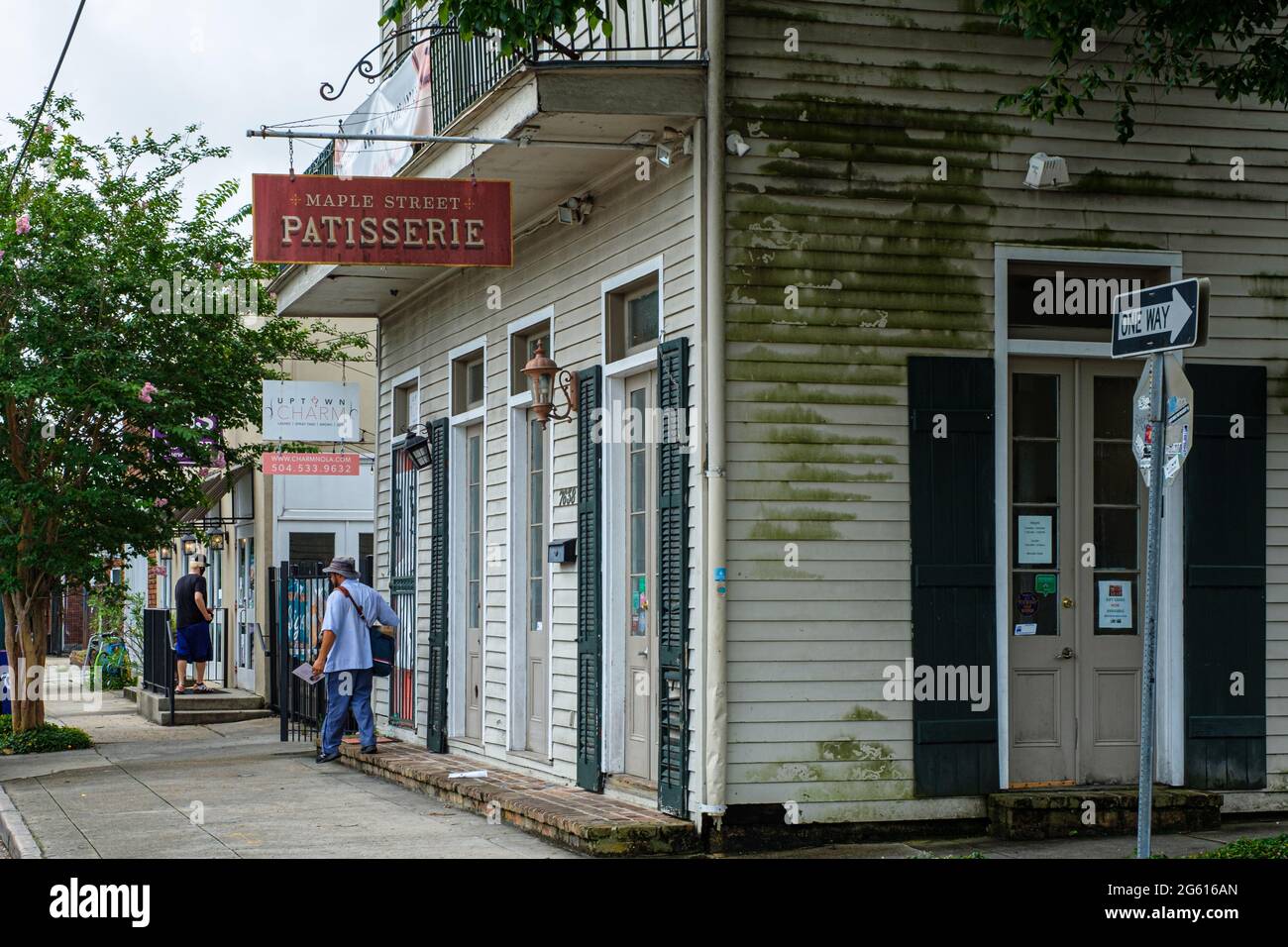 NEW ORLEANS, LA, USA - JUNE 22, 2021: Maple Street Patisserie, mail carrier and adjacent businesses on Maple Street in New Orleans Stock Photo