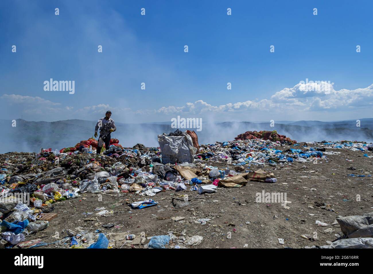 View of an open landfill, food and plastic waste products polluting in ...