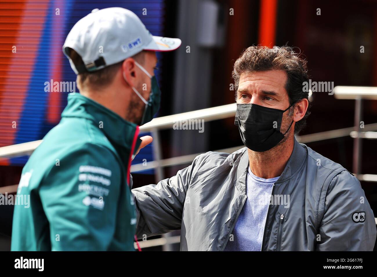 l-to-r-sebastian-vettel-ger-aston-martin-f1-team-with-mark-webber-aus-channel-4-presenter-austrian-grand-prix-thursday-1st-july-2021-spielberg-austria-2G617FJ.jpg