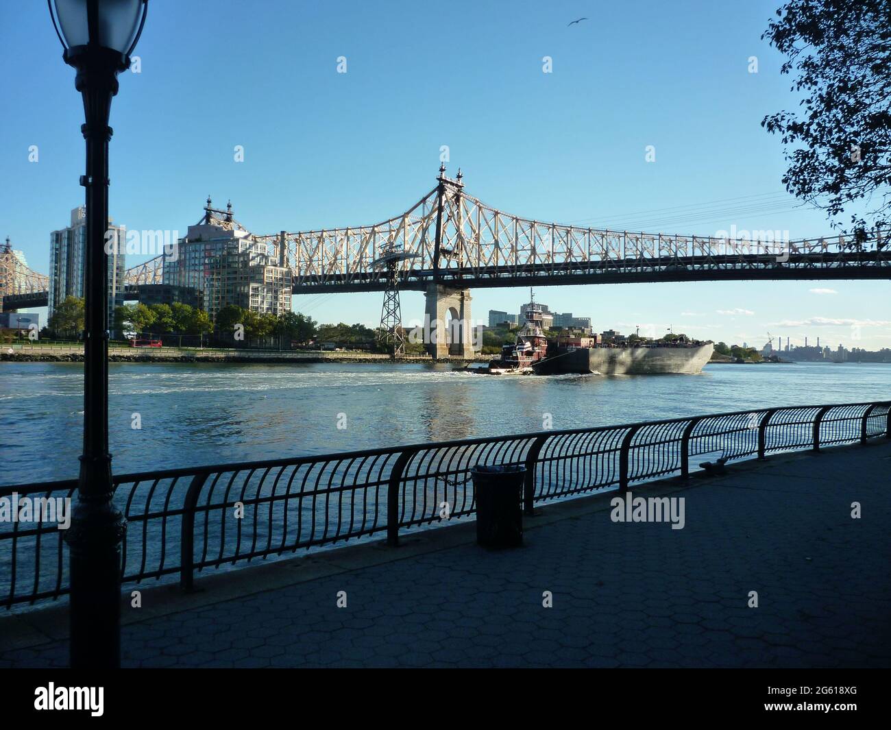 The 59th Street Bridge, also known as the Queensboro Bridge, seen from Roosevelt Island. Copy space. Stock Photo