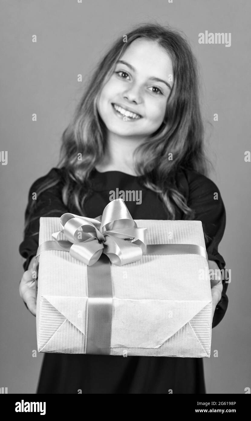 Spread love around. Mothers day recognizes mothers motherhood and maternal bonds. Girl hold gift box. Little child celebrate traditional holiday with Stock Photo