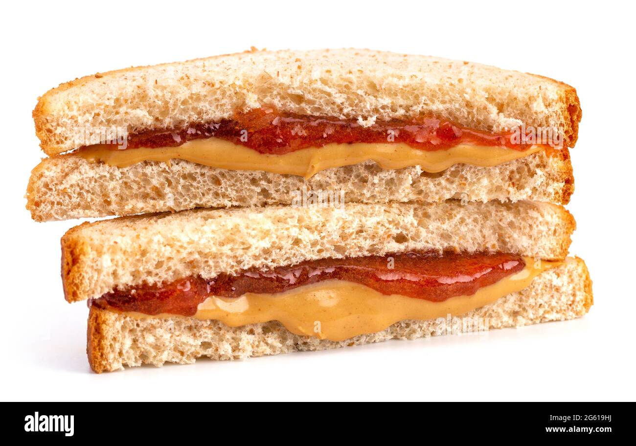 Classic Peanut Butter and Strawberry Jelly Sandwich on Wheat Bread ...