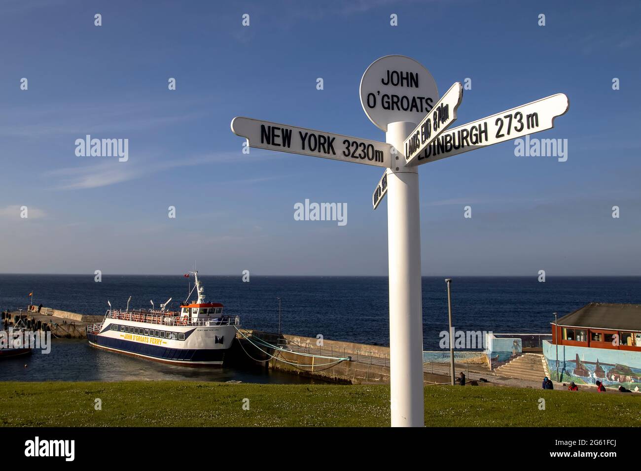 The iconic signpost at John O'Groats in the Scottish Highlands, UK ...