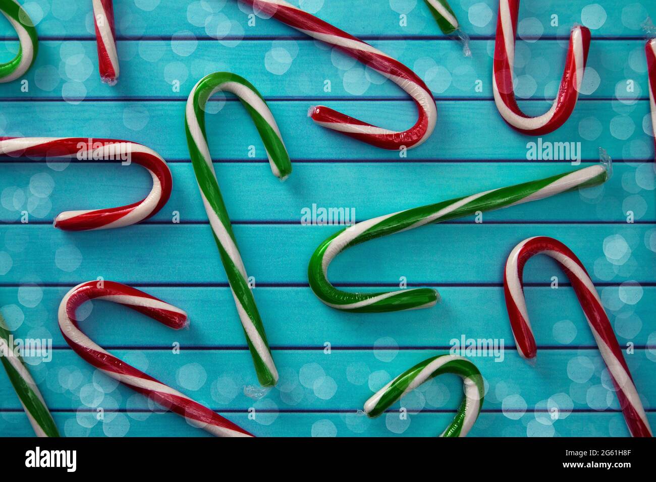 A Christmas Candy Cane Background with Traditional Colored Candy Canes