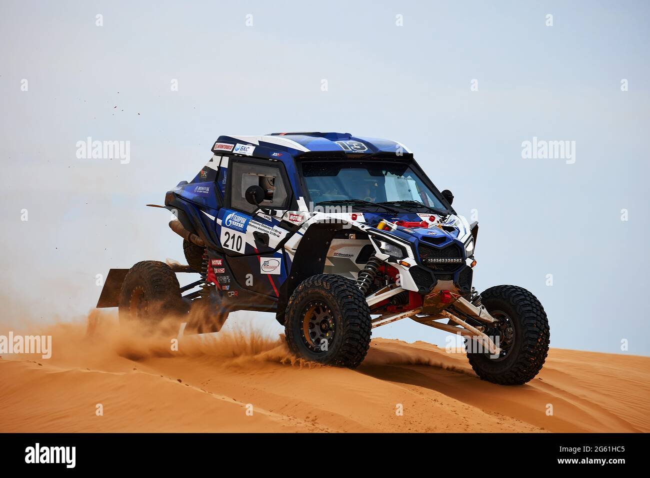 Kagak Rally Robin Women's crew at the rally. Sports car gets over the difficult part of ...