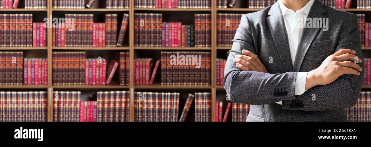 Young Attorney Lawyer In Courtroom With Books Stock Photo