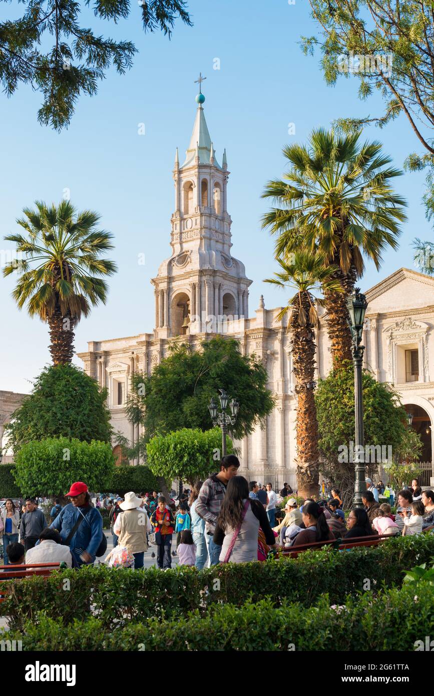 Arequipa, Provincia de Arequipa, Peru - People at the main Plaza with the cathedral Catedral basilica de Arequipa. Stock Photo