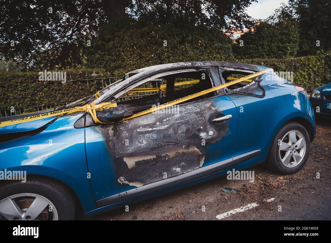 London UK 2021 06 12 An Abandoned Stolen Burnt Out Blue Car Parked On The Sideway Parking 