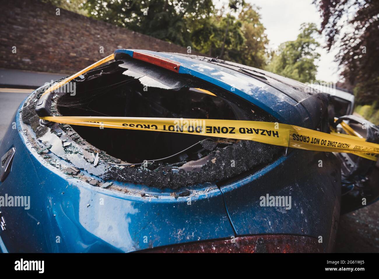London UK 2021 06 12 An Abandoned Stolen Burnt Out Blue Car Parked On The Sideway Parking 