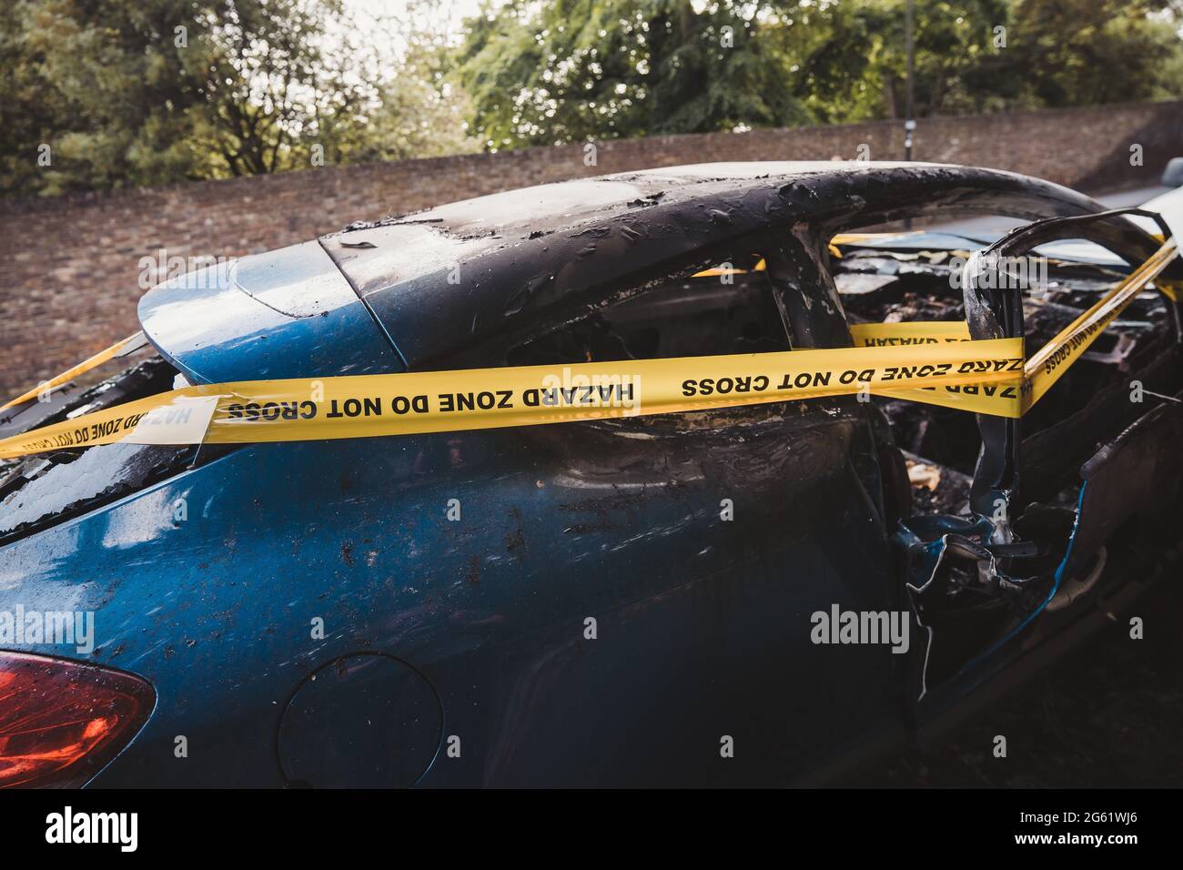 London UK 2021 06 12 An Abandoned Stolen Burnt Out Blue Car Parked On The Sideway Parking 