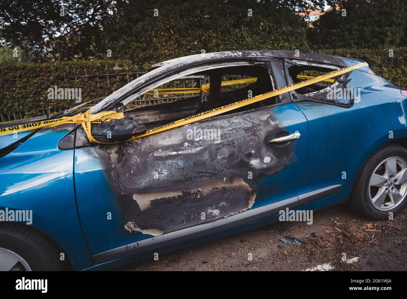 London UK 2021 06 12 An Abandoned Stolen Burnt Out Blue Car Parked On The Sideway Parking 