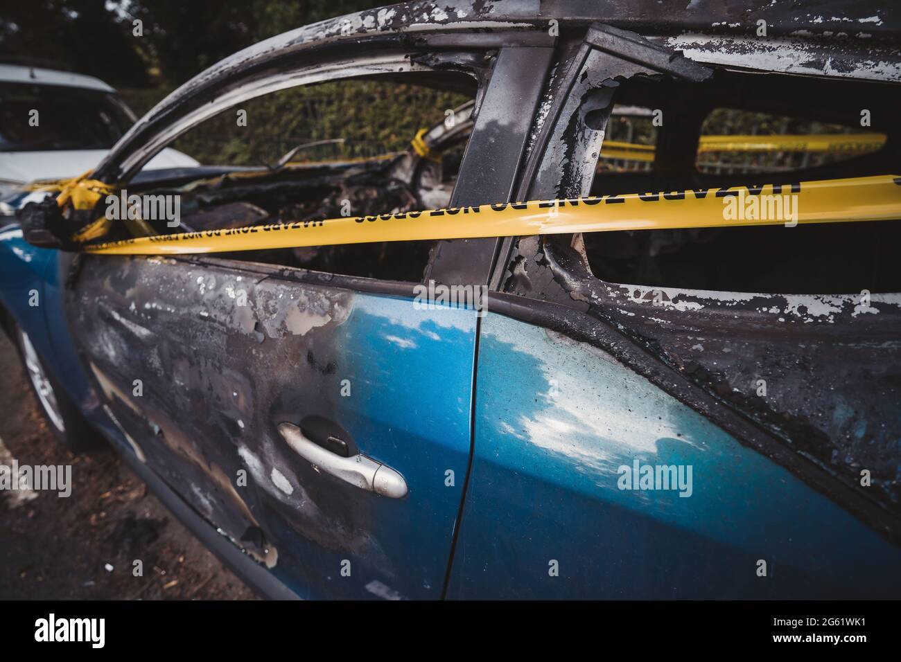 London UK 2021 06 12 An Abandoned Stolen Burnt Out Blue Car Parked On The Sideway Parking 