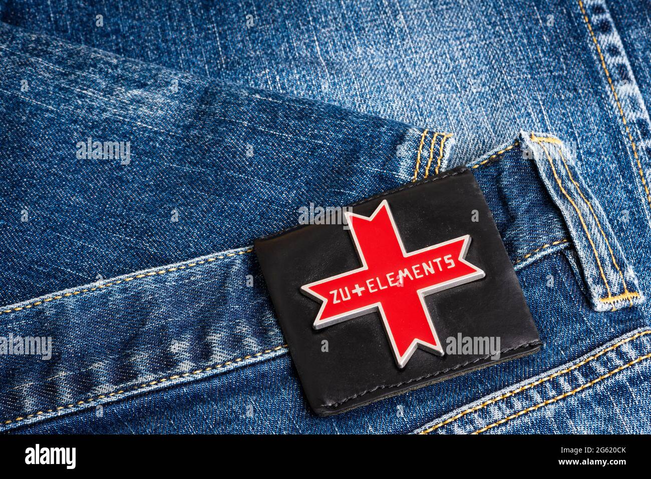 ZU+Elements denim casual brand jeans and metal red label Stock Photo - Alamy