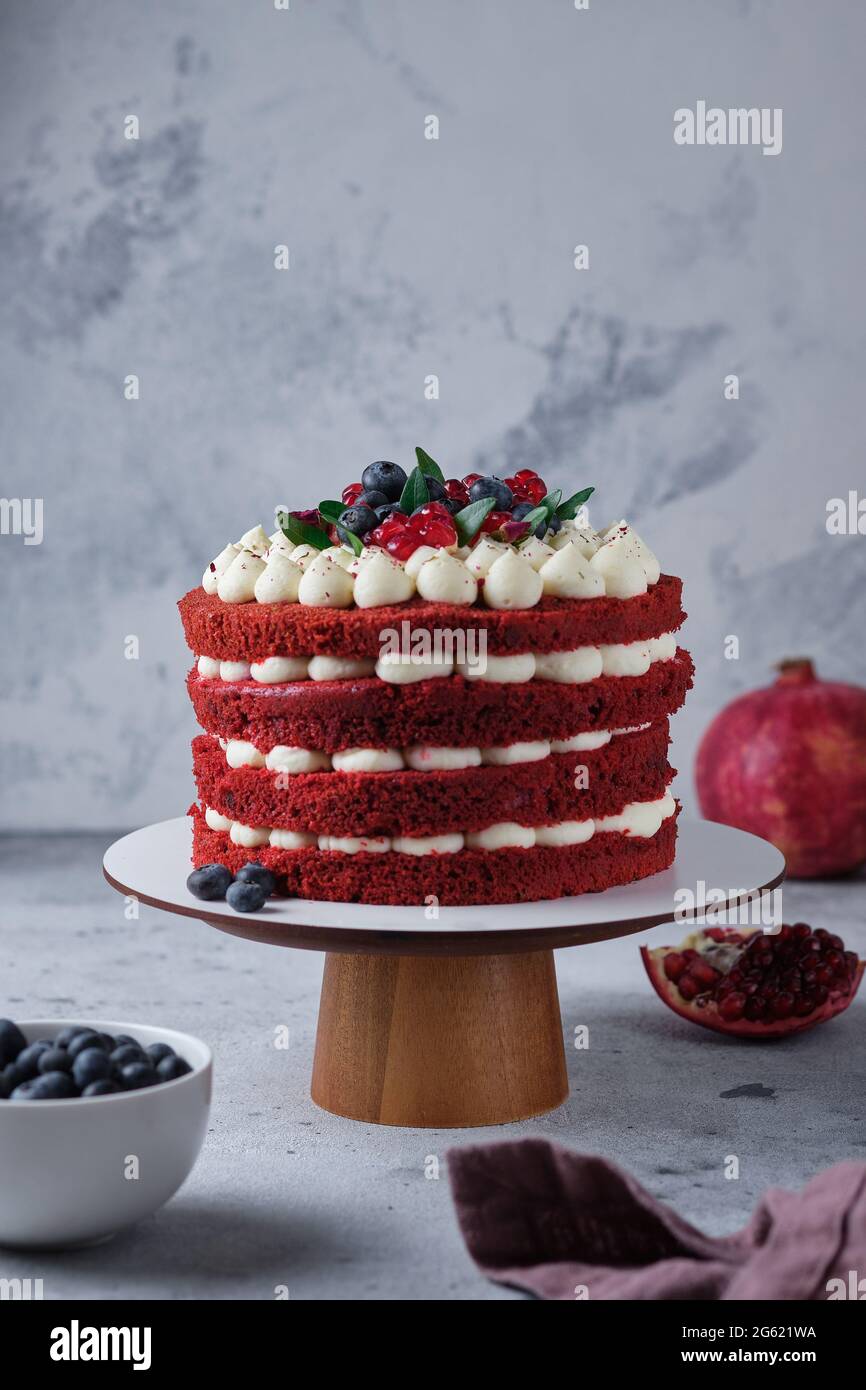 Sponge cake red velvet. Cake with cream cheese cream and raspberry ...
