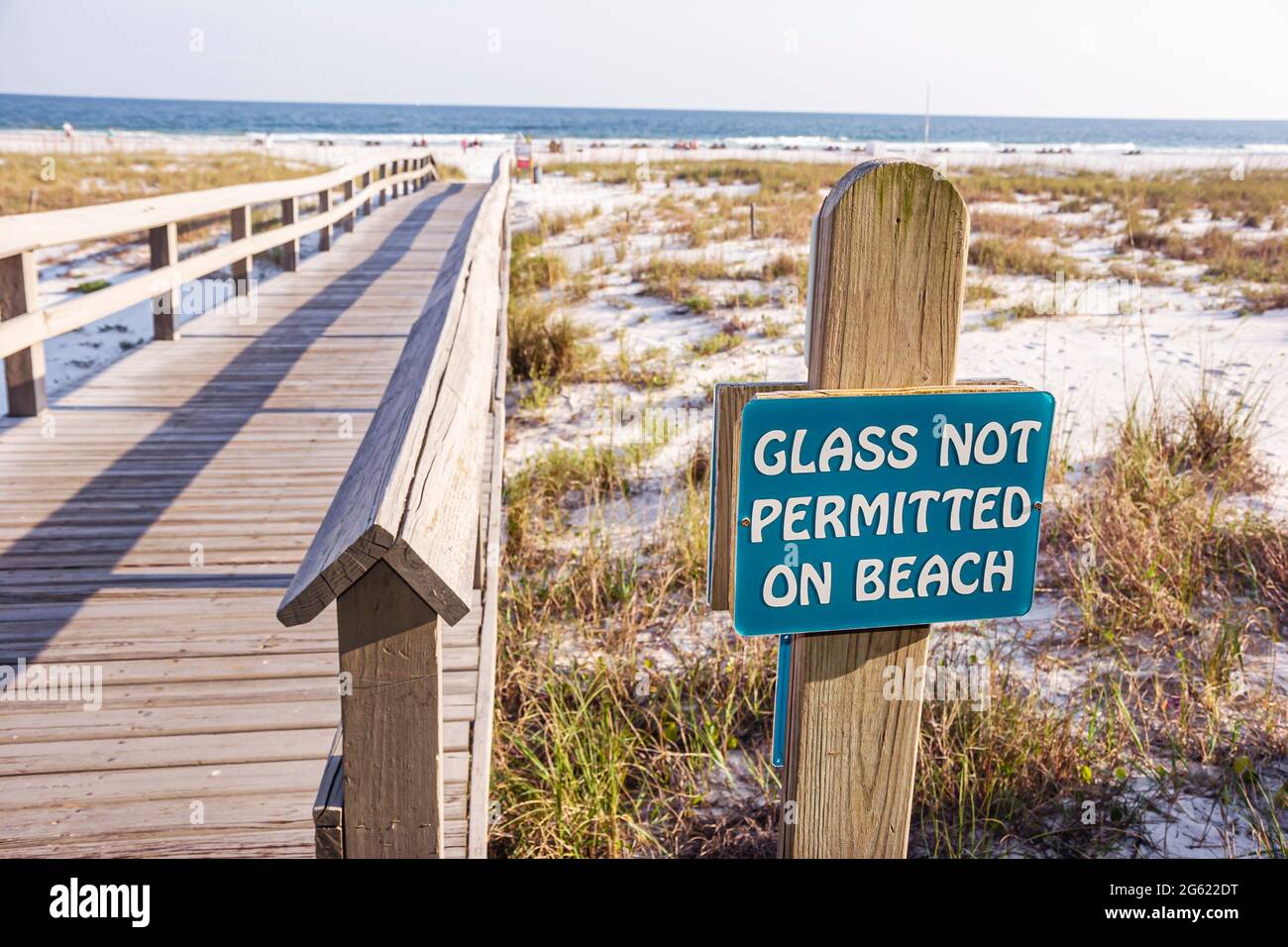 Alabama Orange Beach Island House hotel boardwalk,public beach sign glass not permitted sand dunes Gulf of Mexico, Stock Photo