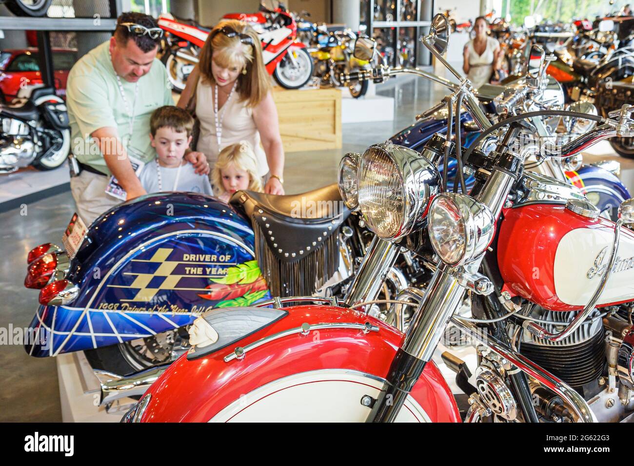 Birmingham Alabama,Barber Vintage Motorsports Museum,motorcycle collection,visitors family father mother son daughter boy girl children looking, Stock Photo
