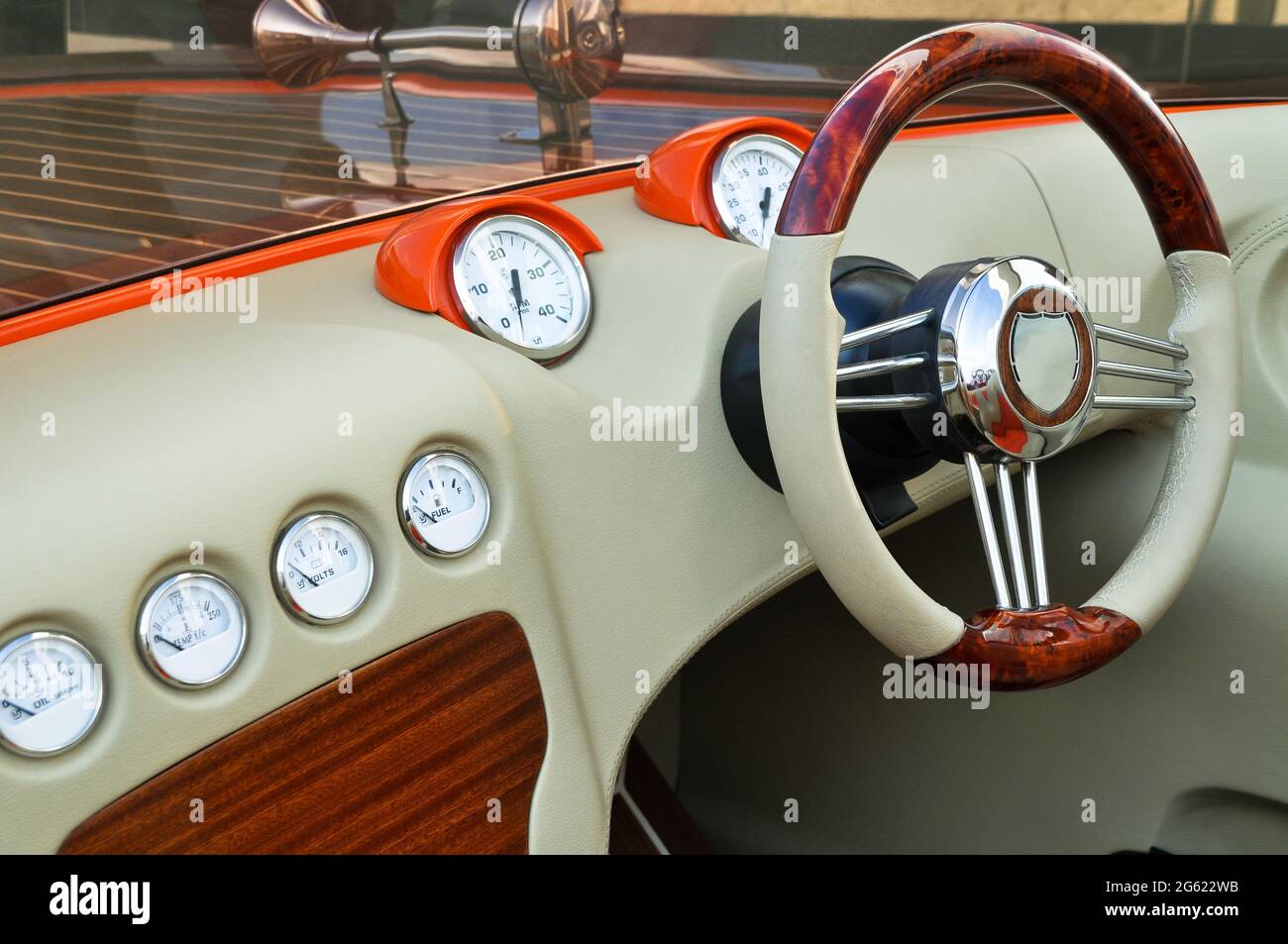 Speed boat steering wheel and instrument panels, luxurious speedboat control panel Stock Photo