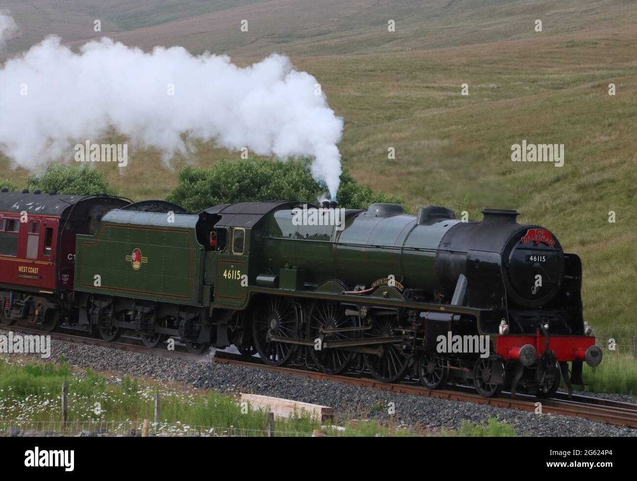 Scots Guardsman, 46115, heading Dalesman special train between Blea Moor and Ribblehead on the Settle to Carlisle railway line on 1st July 2021. Stock Photo