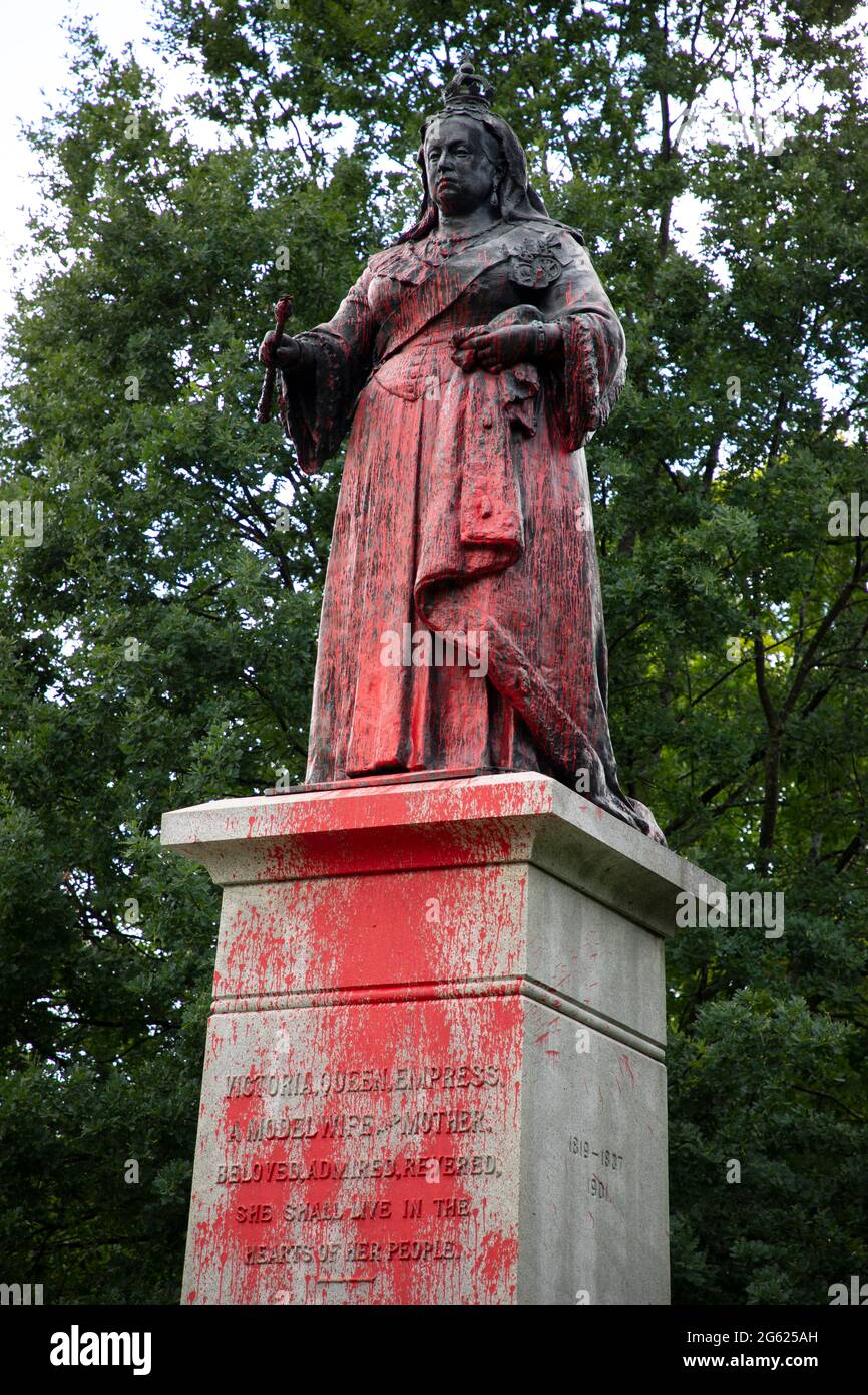 Queen Victoria statue vandalized with red paint in Kitchener’s Victoria Park. Kitchener Ontario Canada. Stock Photo