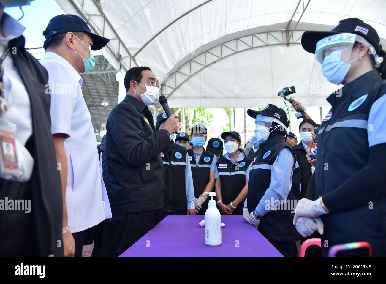 PHUKET, Thailand. July 1, 2021: Thai Prime Minister Prayut Chan-o-cha (2nd L) delivers a speech at a hotel in Phuket, Thailand, on July 1, 2021. From Thursday, Phuket started to waive mandatory quarantine for vaccinated foreign tourists. They can travel to the rest parts of Thailand after staying on the island for 14 nights under the Phuket Sandbox program. (Thai Government House/Handout via Xinhua) Stock Photo