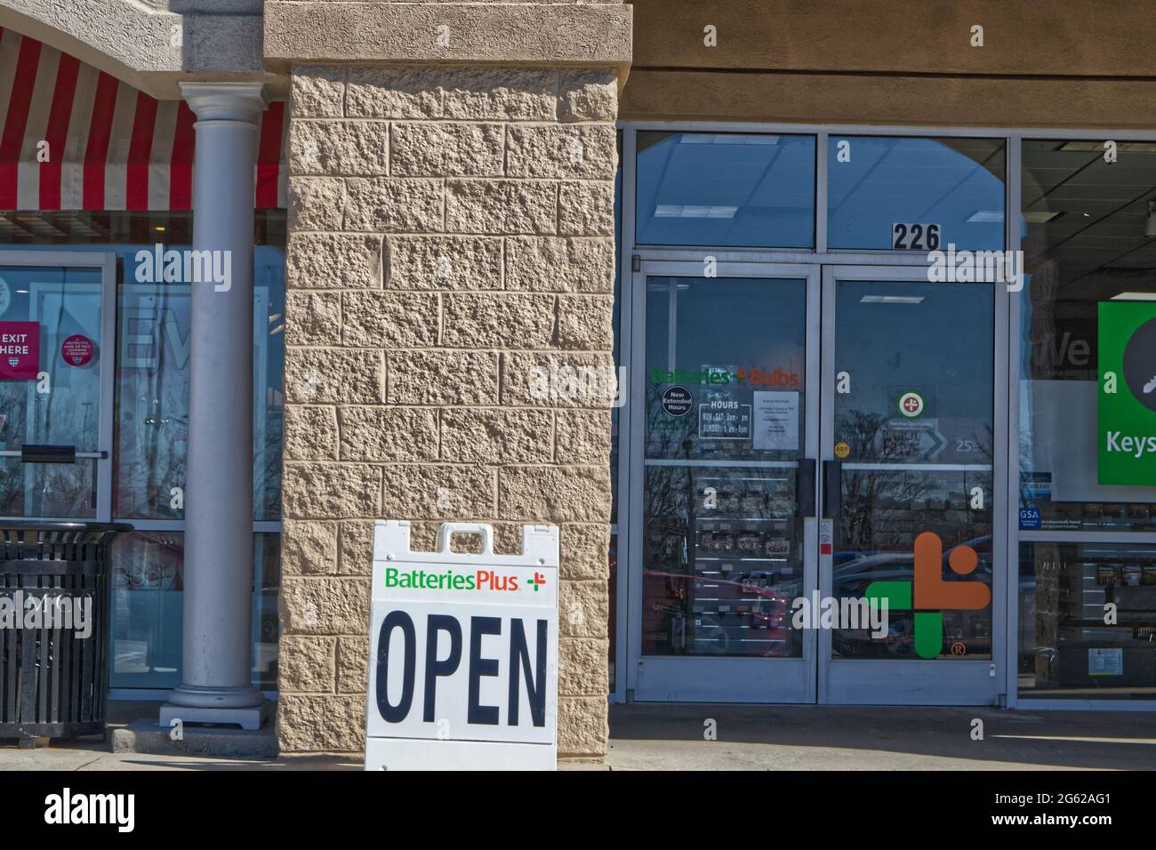 Augusta, Ga USA 03 04 21 Batteries Plus OPEN sign and entrance